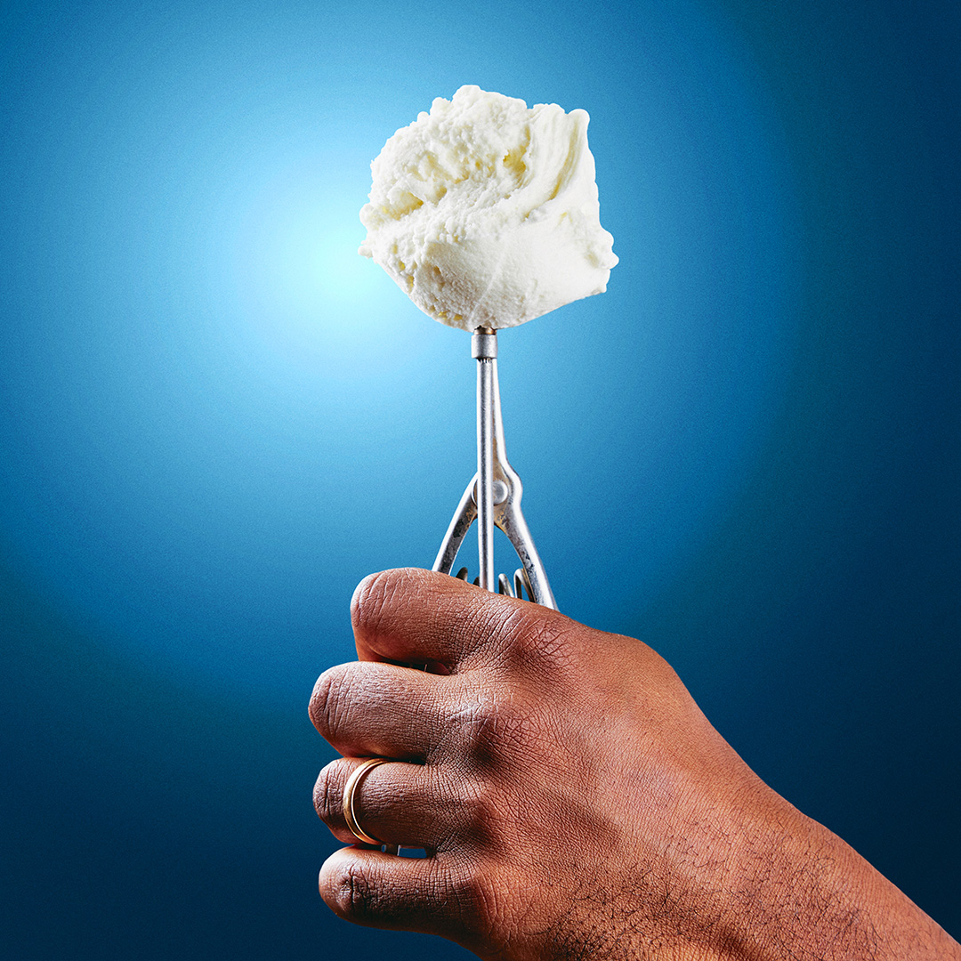 icecream gelato scooper hand blue background